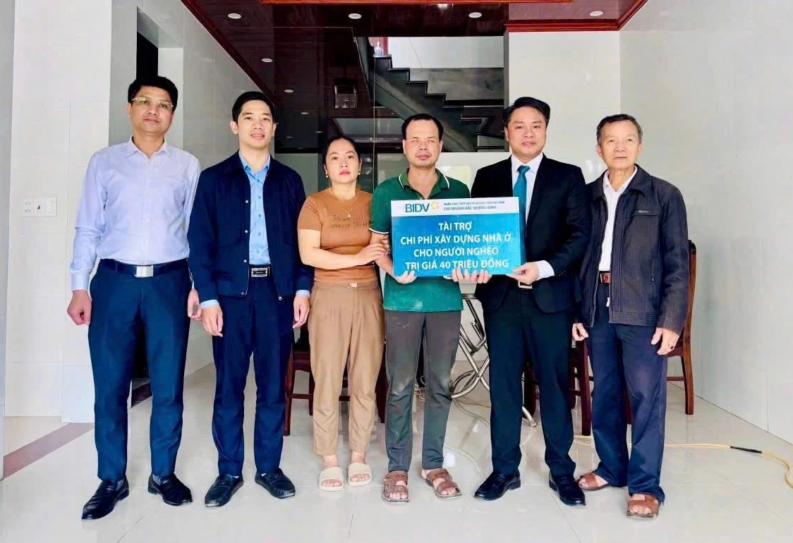 Hỗ trợ kinh phí xây nhà ở cho người khiếm thị tại phường Ba Đồn - Ảnh: X.P

